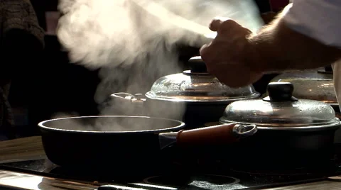 Chef s kitchen black pan baking Stock Footage 60870767