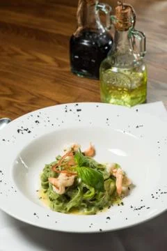 Chef s specialty presented in restaurant on served table Stock Photos