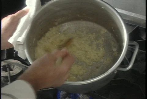 Chef sautes onions Stock Footage 145733