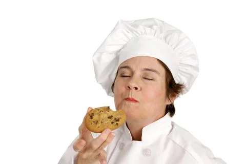 Chef Savors a Cookie Stock Photos