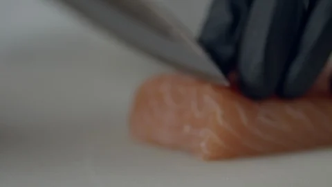 Chef At A Seafood Restaurant Is Preparing Salmon Sashimi And Serving It On Ice Video stock 113402723