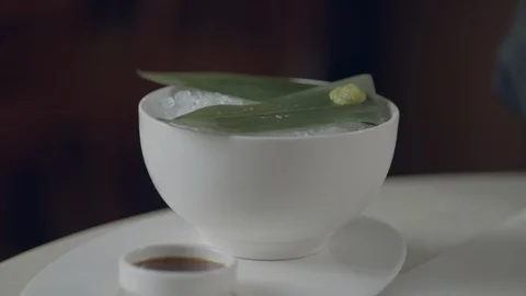 Chef At A Seafood Restaurant Is Preparing Scallop Sashimi And Serving It On Ice Video stock 113403512