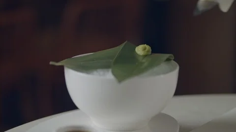 Chef At A Seafood Restaurant Is Preparing Scallop Sashimi And Serving It On Ice Video stock 113403848