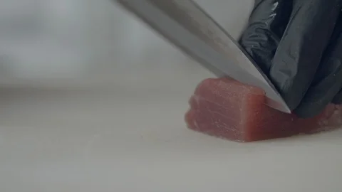 Chef At A Seafood Restaurant Is Preparing Tuna Sashimi And Serving It On Ice Video stock 113402231