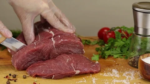 The chef separates a piece of beef pulp Stock Footage 122205464
