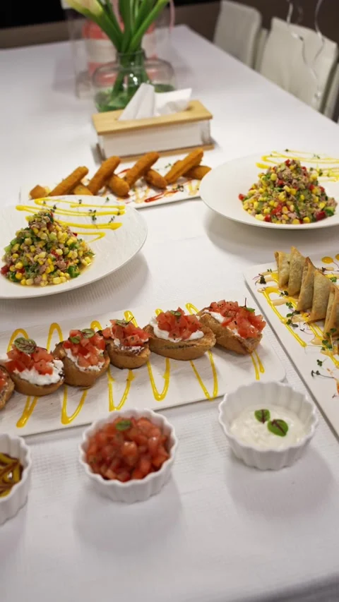 The chef serves and decorates the finished food on plates Stock Footage 311796332