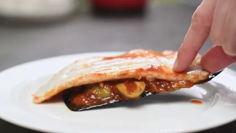 Chef serves a fish with tomato and olives sauce. Stock Footage 151194769