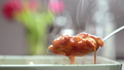 Chef serves fresh baked chicken pieces with mozzarella in tomato sauce. Stock Footage 154370055