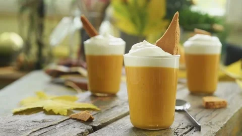 The chef serves the homemade pumpkin pudding. Stock Footage 202176983