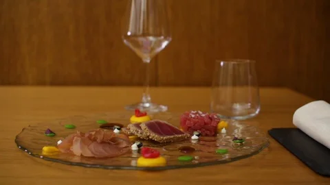 Chef Serves Meat By Adding Oil on a Plate 01 Stock Footage 86248388