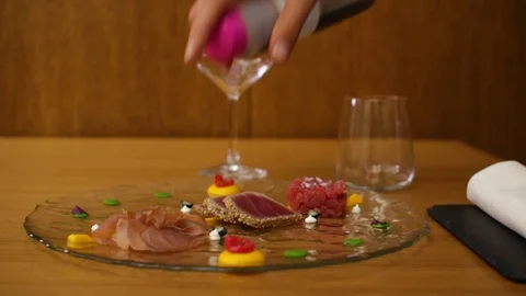 Chef Serves Meat By Adding Oil on a Plate Stock Footage 86248425