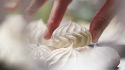 Chef serves meringues on the table. Stock Footage 152529420