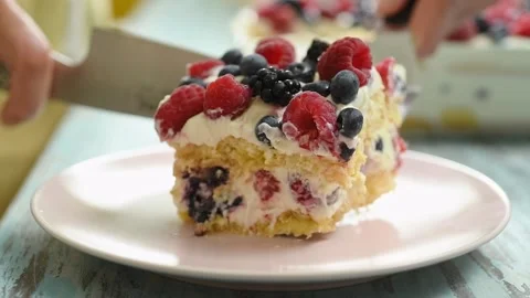 The chef serves no bake yogurt and berry cake on the plate. Stock Footage 210718011