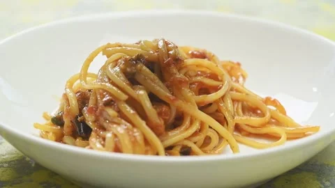 The chef serves pasta alla norma. Stock Footage 169798071