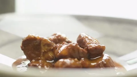 Chef serves red wine pork stew. Stock Footage 159872962