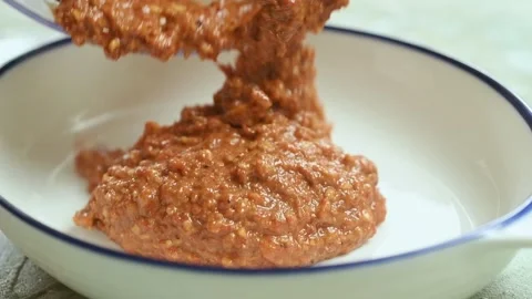 The chef serves roasted red pepper dip. Stock Footage 200810625