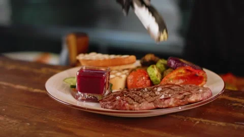 The chef serves the steak. Close up Stock Footage 131152137