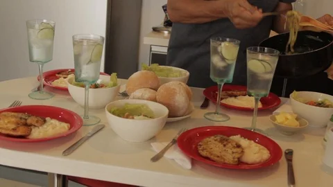 Chef serving bread, chicken, bread, salad and mashed potatoes Stock-Footage 88389808
