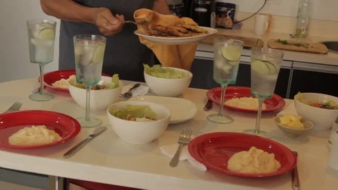 Chef serving chicken bread at beautifully set table Stock Footage 88389769