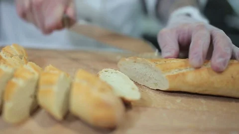 Chef serving crusty baguette Stock Footage 71559011