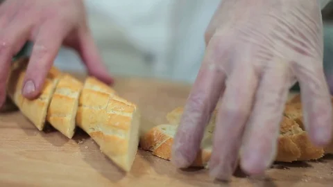 Chef serving crusty baguette Stock Footage 71559046
