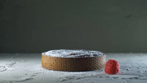 Chef serving a dark chocolate tart putting a raspberries near Stock Footage 127643886