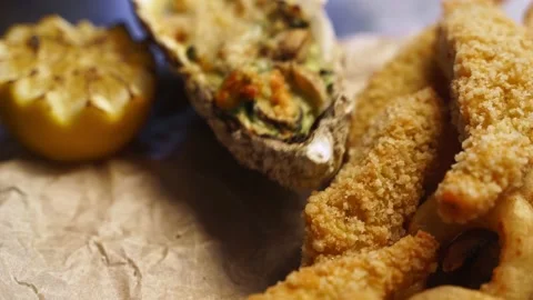 Chef serving deep fried fish mix food set composition. Cook puts squid rings 스톡 동영상 158853658