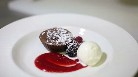 Chef serving delicious chocolate dessert with ice-cream Stock Footage 67455885