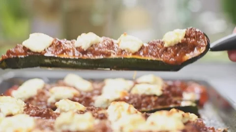 Chef serving delicious stuffed zucchini. Video stock 154940162