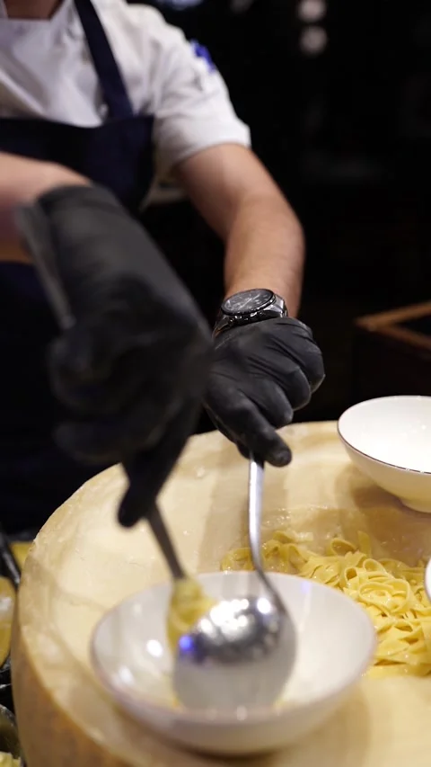Chef Serving Fresh Pasta Dish to Customer in Restaurant Stock Footage 294807075