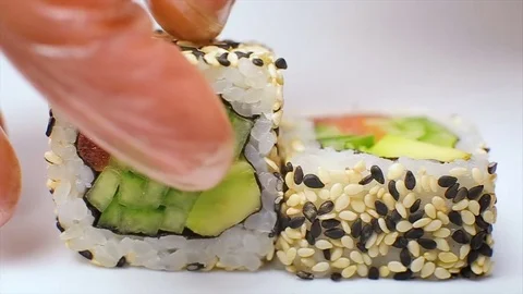 Chef serving luxury sushi rolls in japanese hotel restaurant Goma Maki Stock Footage 73103240