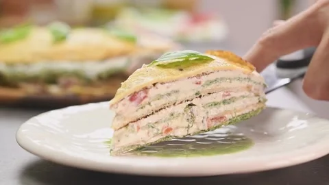 Chef serving piece of delicious omelette cake. Stock Footage 159400783