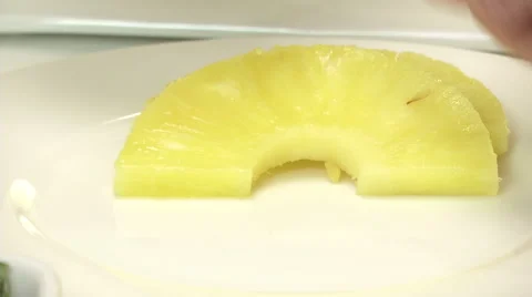 Chef serving pineapple on a dish  Stock Footage 47966506