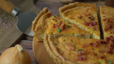 Chef serving Quiche lorraine or French tart, an savoury open pie. Stock-Footage 132449743