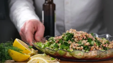 Chef serving salad Stock Footage 240134294