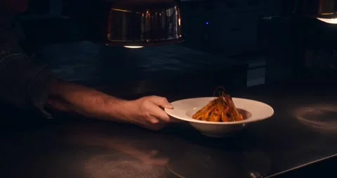 Chef Serving Shrimps on a Plate Stock Footage 141201894