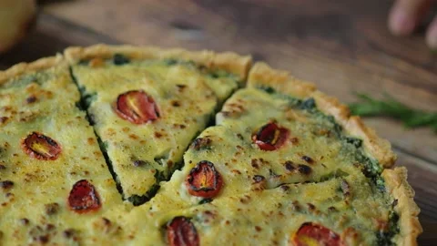 Chef serving Spinach Quiche or French tart, an savoury open pie. Stock Footage 131718679