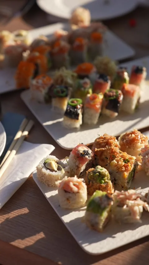 The chef sets the table with ready-made food and drinks and a luxury yacht. Stock Footage 334851860