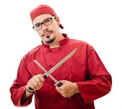 Chef sharpening a knife isolated on white background Stock-Fotos