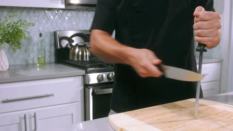 Chef sharpens the knife Video stock 221567747