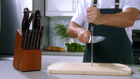 Chef sharpens the knife Stock Footage 236206810