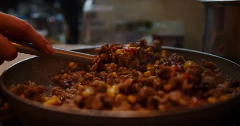 A chef showcases how to prepare a delicious chili in this video Stock Footage 307935761