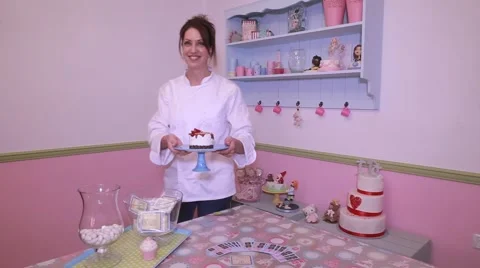 Chef showing decorating cheesecake with fresh strawberries Vídeos de archivo 61879875