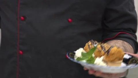 Chef is showing of eastern dessert. Arabic ice-cream Stock Footage 88866395