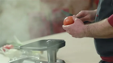 Chef showing the trick how to peel tomatoes easily. Two shots Stock Footage 50760254