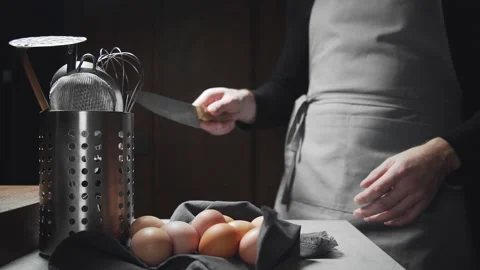 Chef shows ability of masterful using the kitchen stuff whisk in mans hand Stock Footage 143779483