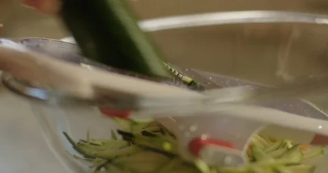 Chef Shreds Vegetable 스톡 동영상 105370325