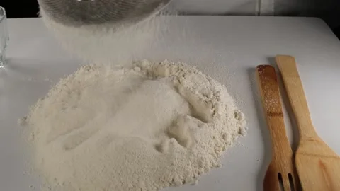 Chef sifting flour Stock Footage 238015296
