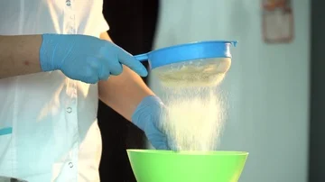 The chef sifts flour Stock Footage 85666589
