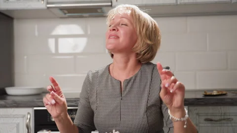Chef Singing Joyfully Snapping Fingers and Dancing with Passion in Kitchen Stock Footage 307994201